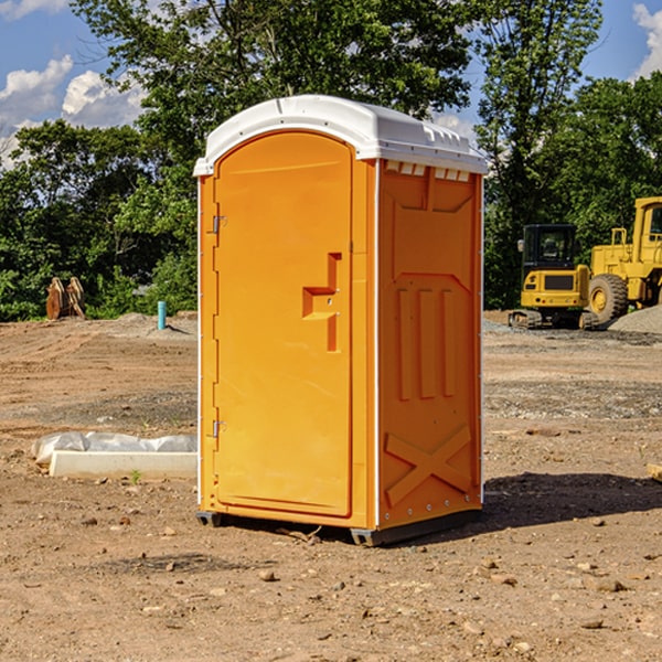 how often are the portable restrooms cleaned and serviced during a rental period in Carlisle